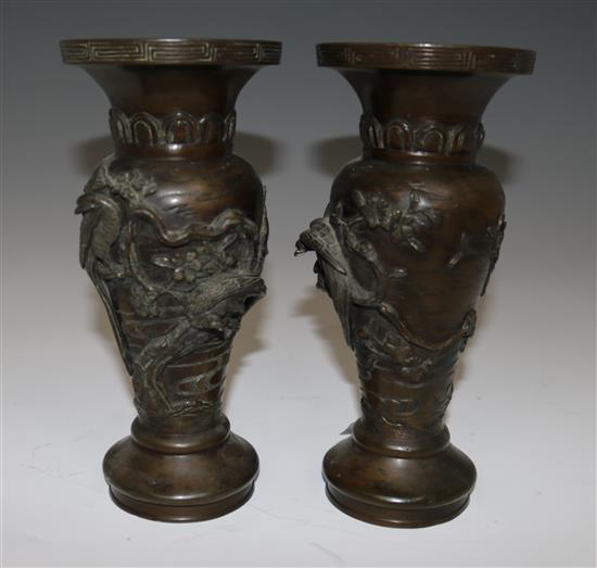 A pair of Japanese bronze vases, 25cms